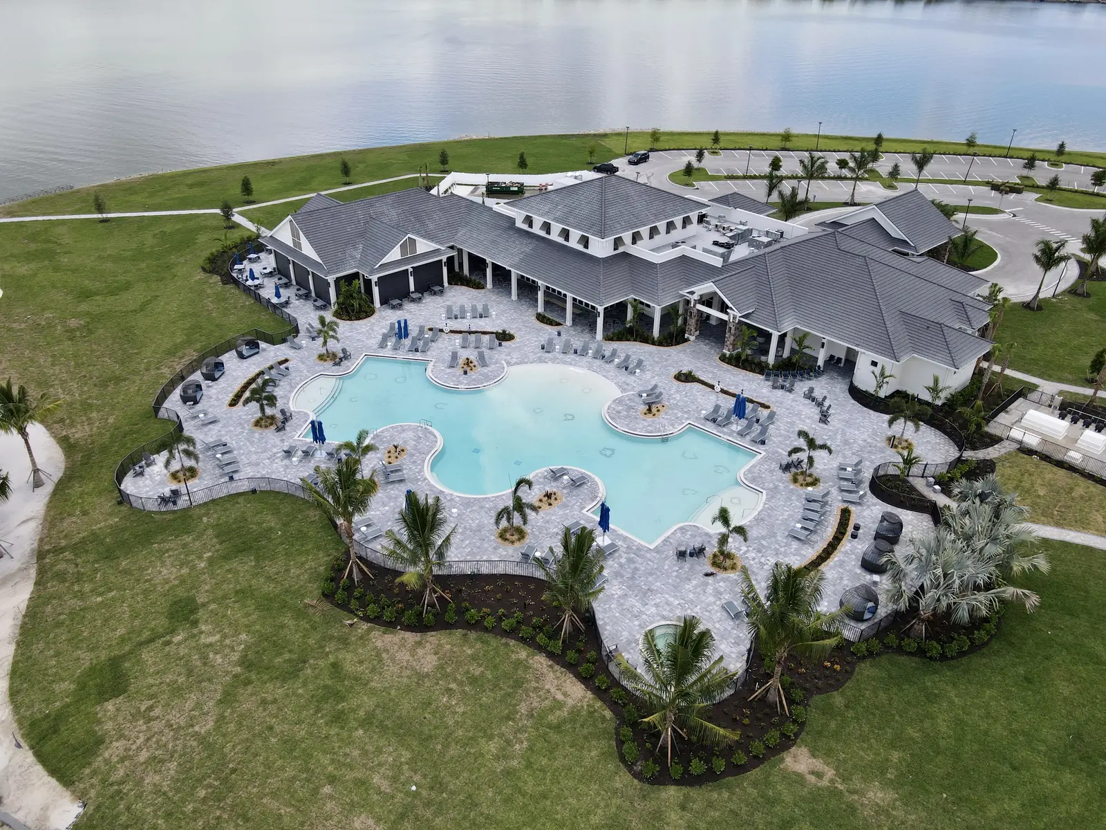 Resort style pool and cabanas beside the Social Club
